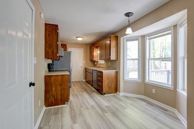 Photo - Ranch home on fenced lot-new flooring and ...