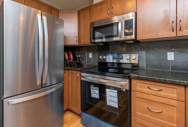 Photo - 122-122 Village Heights SW