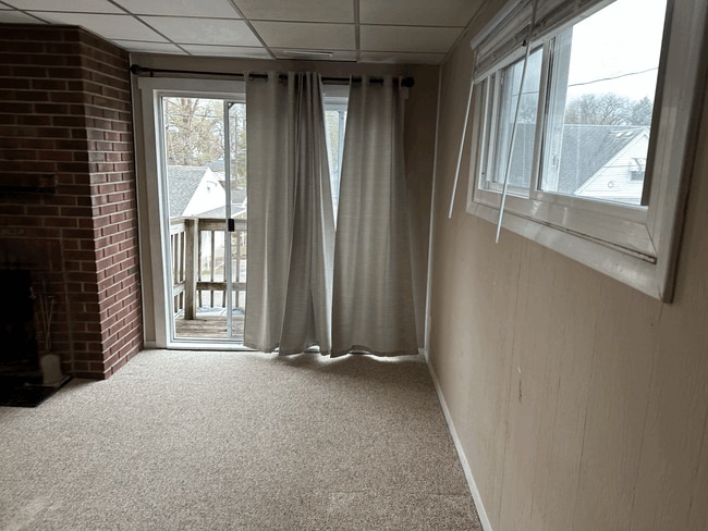 Leaving room with the balcony - 834 S Walnut St Unit 834R S. Walnut