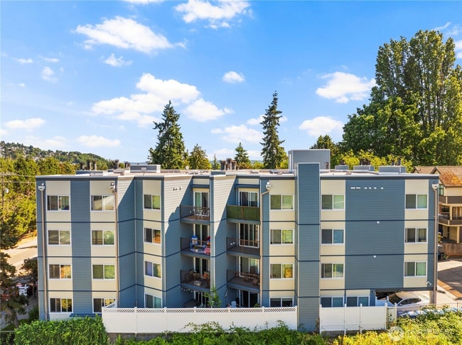 Building Photo - 3045 20th Ave W Unit 210