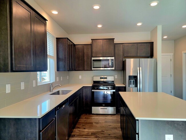 Photo - Brand New 3 bed with loft and fully fenced yard in convenient CK location!