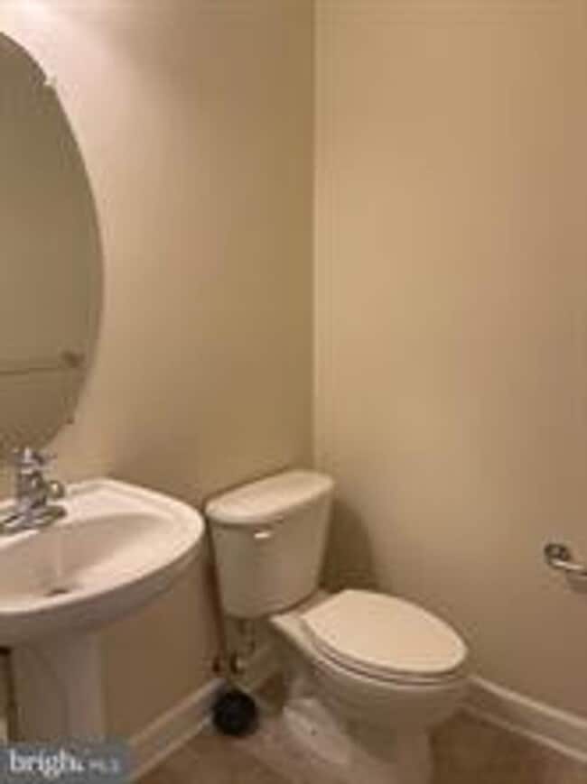 Photo - END UNIT TOWNHOUSE WITH 2 CAR GARAGE, 4 BEDROOMS AND 3.5 BATHS..FINISHED REC ROOM
