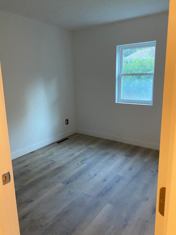 Photo - Beautifully Renovated 4-Bedroom Home Near ...