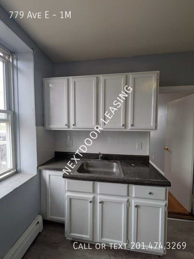 Building Photo - 779 Ave E Unit 1M