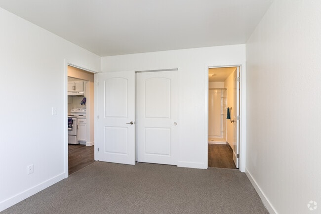 3BR, 2BA - 921SF - Primary Bedroom - Grace Apartments