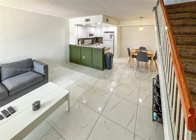 Building Photo - 650 NW 86th Pl Unit 3-209