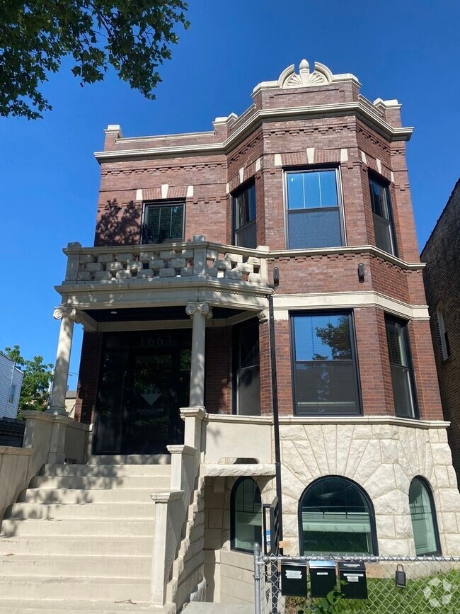 Building Photo - 1663 S Troy St Unit G Rental