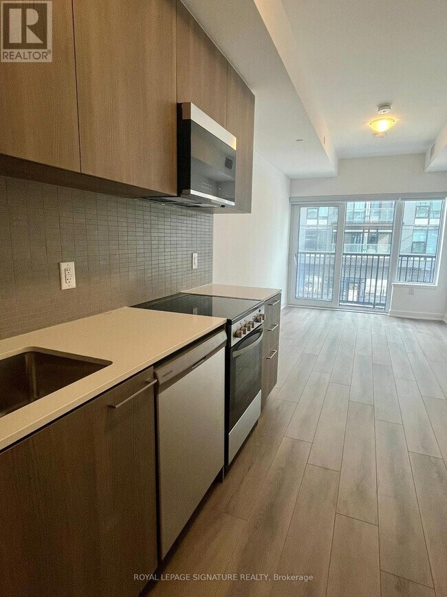 Photo - 7437 Kingston Rd Unit 208