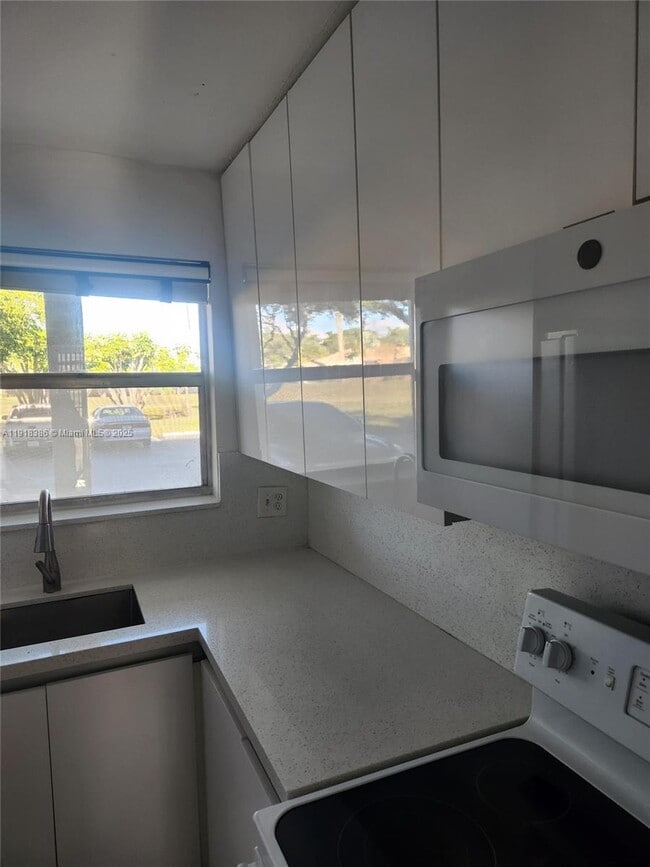 Photo - 8450 Sunrise Lakes Blvd Unit 106