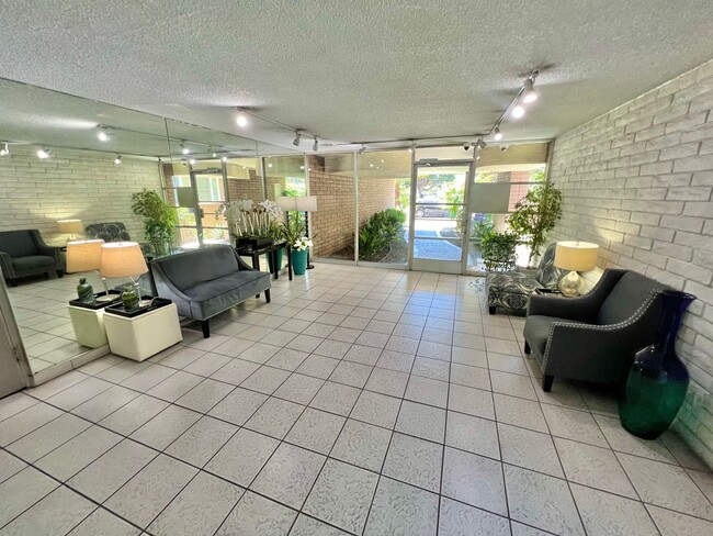Building Photo - Modern 2 bedroom Gem Near Bixby Park | Private Balcony & Secured Parking Unit 206