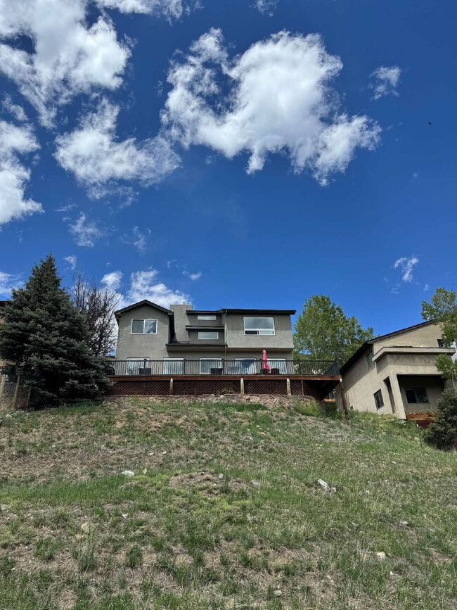 Photo - "Charming 4-Bed Oasis with 3 Full Baths and 2,275 Sq Ft of Comfort in Evergreen, CO!"
