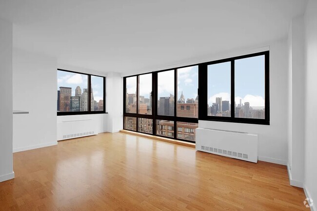 Building Photo - 124 W 60th St Unit 50A Rental