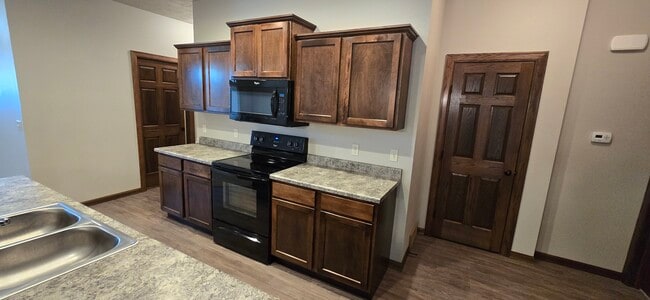 Custom millwork and six panel doors that elevate every room.. - 3511 E Bison Trl