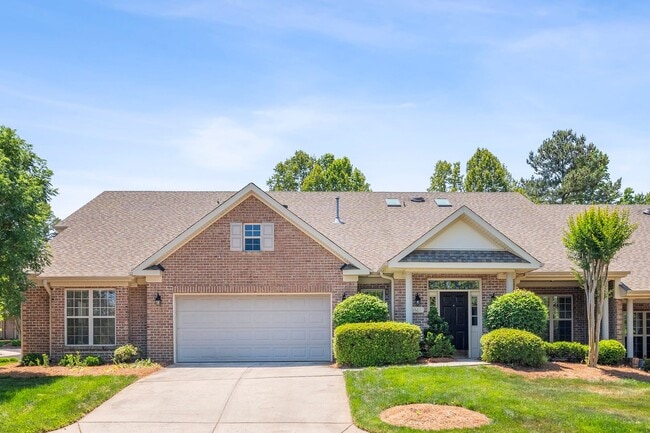 Building Photo - NW Brick Townhome, Granite Counter-Tops, Wood Floors, FP, Garage!