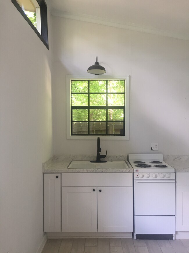 Farmhouse setting with modern touches - 1742 N Parkway Unit Rear