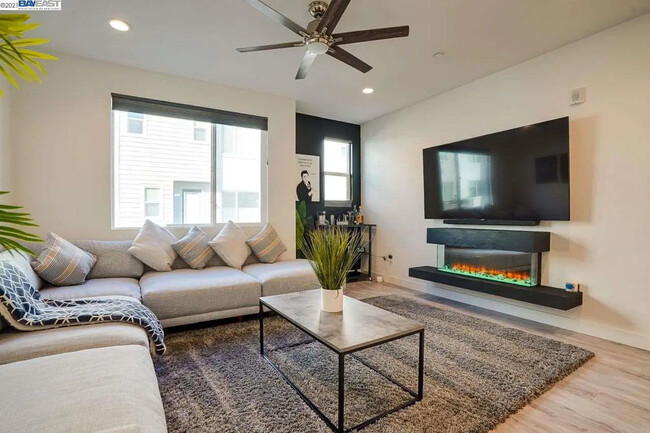 Living room with fire place - 154 Uptown Cir Townhome