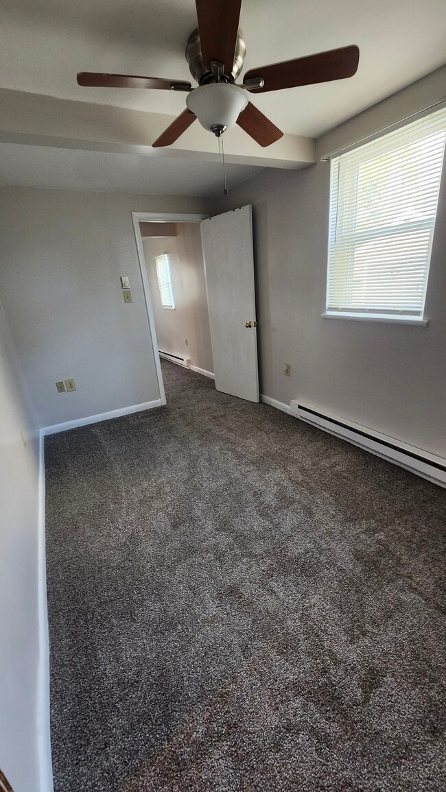 Bedroom/door to LR - 317 Clearfield Ave Unit Apt. C