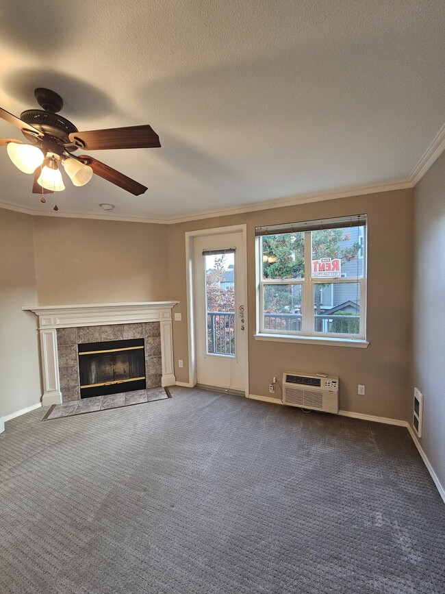 Living Room - Wood Fireplace - 1802 SE Cutter Ln