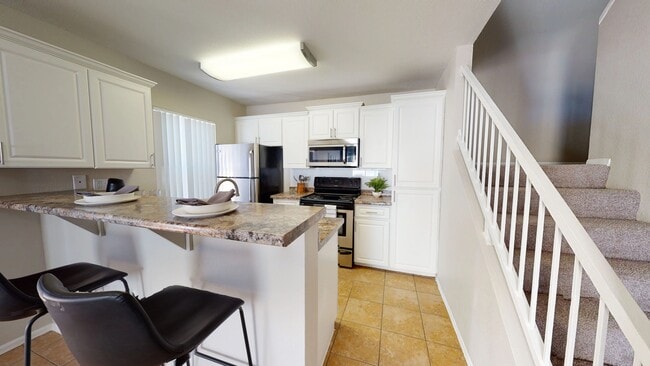 Our townhomes offer expansive kitchens with subway tile backsplashes, granite-style counters, and stainless-steel Frigidaire-brand appliances for an incredible homey feel and a space you cherish.