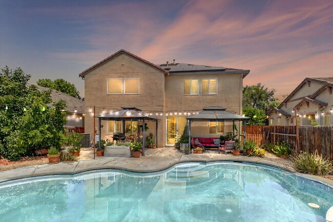 Building Photo - Solar-Powered Pool Home for Rent in Desira...