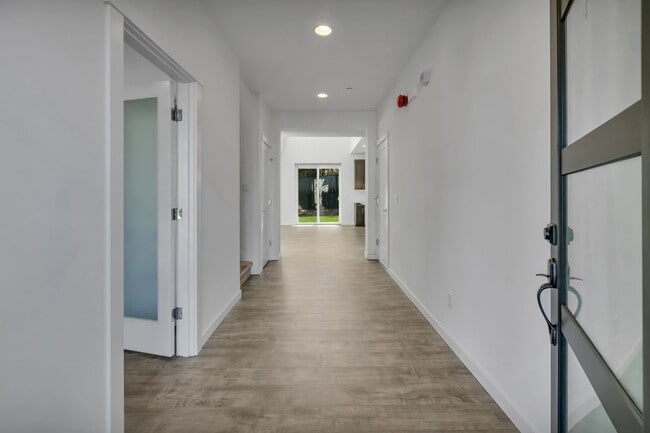 Photo - Stunning 5 Bedroom Home with Guest Suite, Modern Kitchen & Fenced Yard