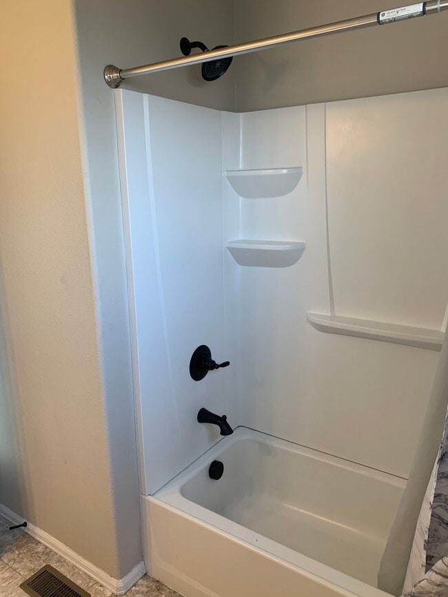 Photo - Beautiful 4 Bed/3 Bath West Greeley Home – Spacious Lot & Great Location!