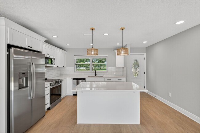 Photo - Fully Remodeled 3BR Home with Large Fenced Yard & New Deck