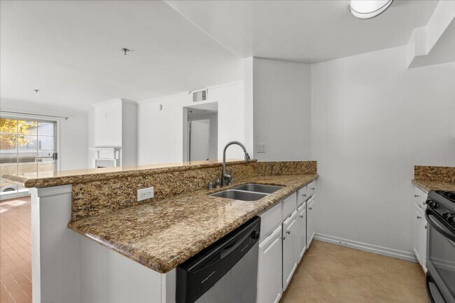 Photo - Bright 3-Bedroom Condo with Balcony and Fi... Unit 102