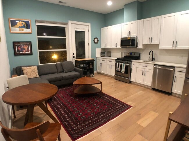 living room/kitchen - 4308 Georgia Ave NW Unit Sunny Petworth Condo