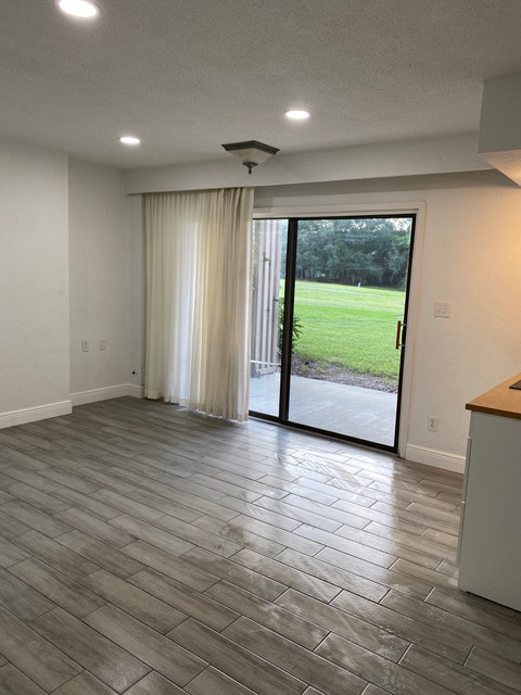 Main room with slider to private porch - 830 Pinewood Ct Unit 830