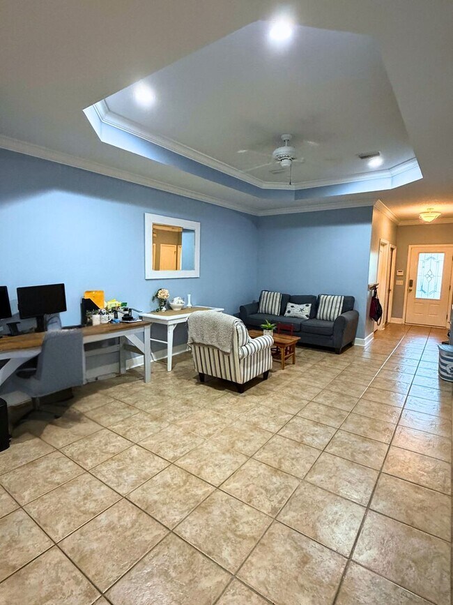 Photo - 3/2 with grass cutting included & access to community amenities.