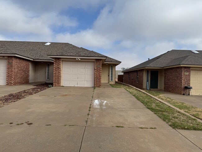 Building Photo - Updated Duplex Located West of Frankford Near WalMart, Take-Out & Close Access To W. Loop 289!