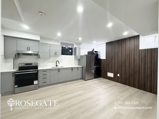 Photo - Bright 2-Bedroom Basement Apartment with P... Unit 2