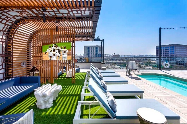 We're all about that view! Lounge the day away on stylish lounge seating on the rooftop pool deck