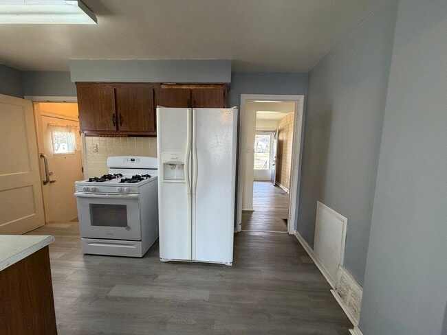 Photo - Bright Cape w/ Sunroom, Central Air, Big Basement & Backyard Shed