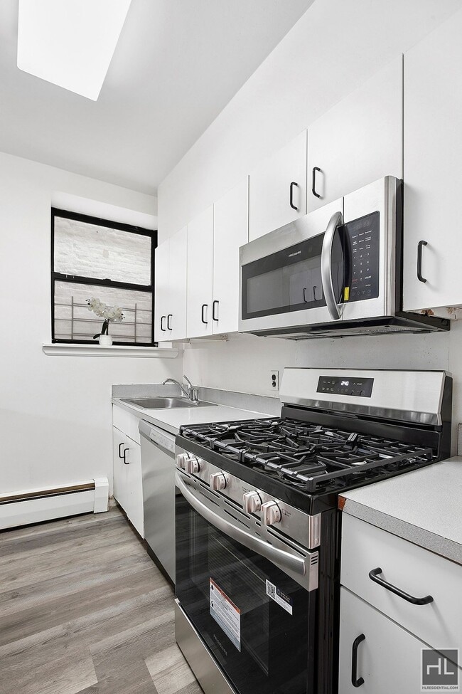 Photo - Steps to Central Park & Subways: Massive Kingsize 1BR at St Nicholas Court Condominium Unit 4E