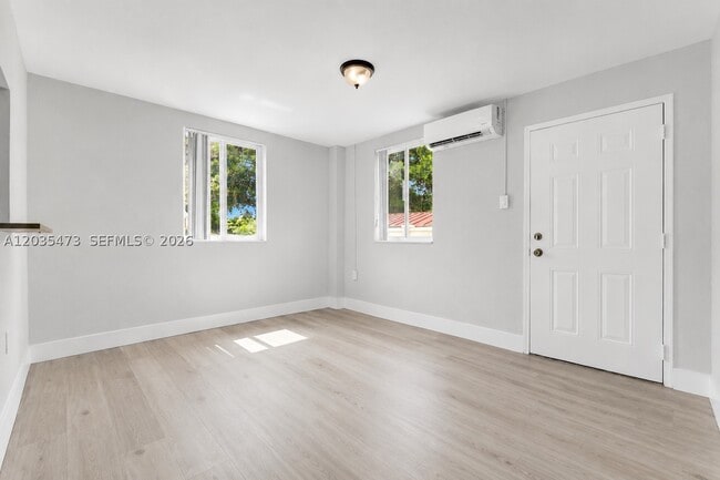 Building Photo - 6647 SW 59th St Unit 101