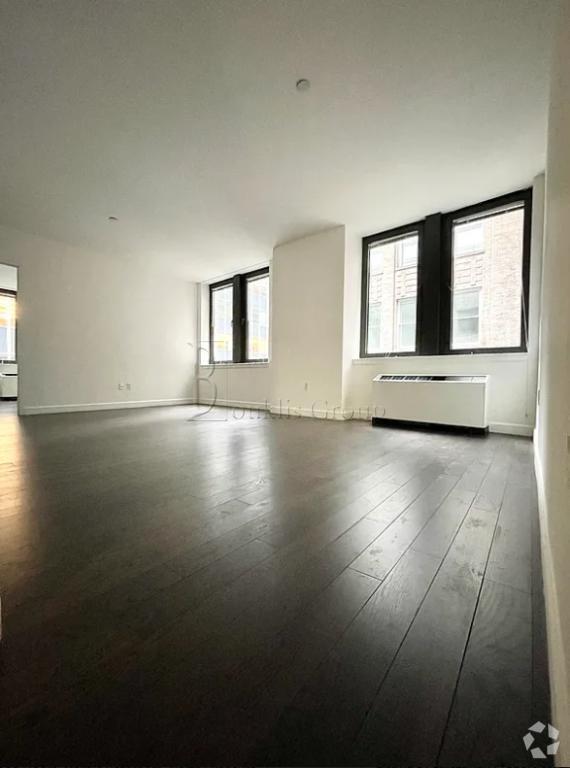 Building Photo - 3 bedroom in Manhattan NY 10004 Unit 401A Rental