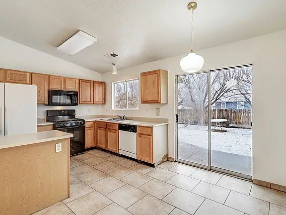 Photo - "Spacious 4-Bedroom Gem on Quartz Dr – Your Ideal Albuquerque Retreat!"