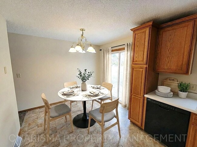 Photo - 4 BD, 2 BA - FENCED IN YARD, PRIVATE TRAILS, FINISHED UPPER AND LOWER LIVING AREAS, ATTACHED GARAGE!