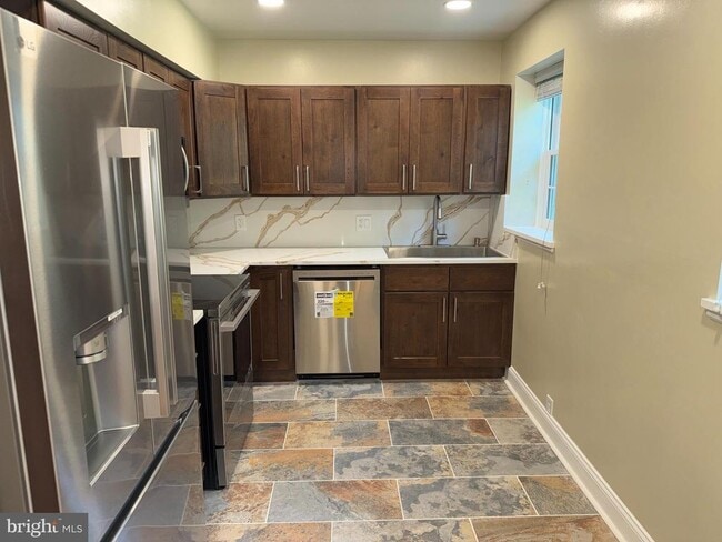 Building Photo - 3881 Porter St NW Unit A295