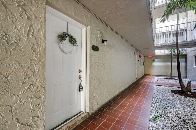 Building Photo - 10000 NW 80th Ct Unit 2124
