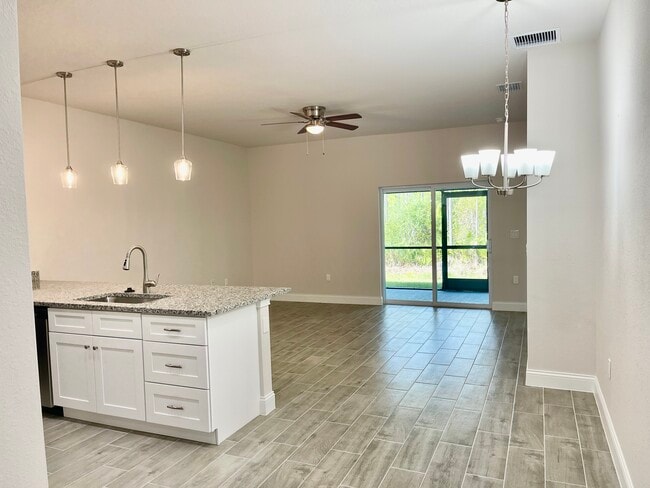 Kitchen. Living and Dining Room - 24487 Zephyr Ct Unit 24487 Zephyr Court