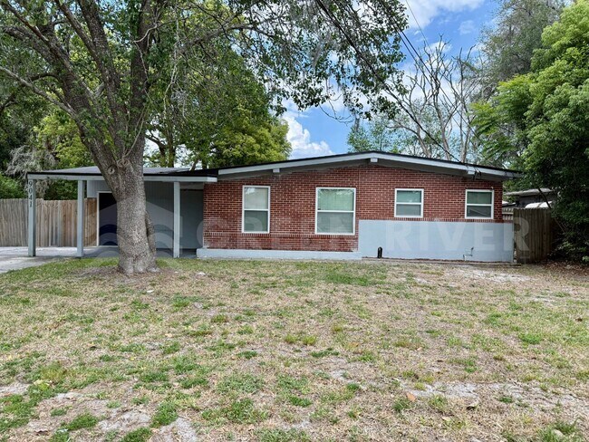 Building Photo - Fully Renovated 2BR Brick Home with Vaulted Ceilings & Backyard Retreat!