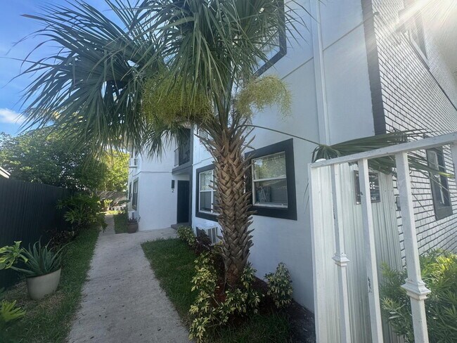 Photo - Modern 2-Bedroom | New Kitchen, Bath & Til... Unit Apt 4