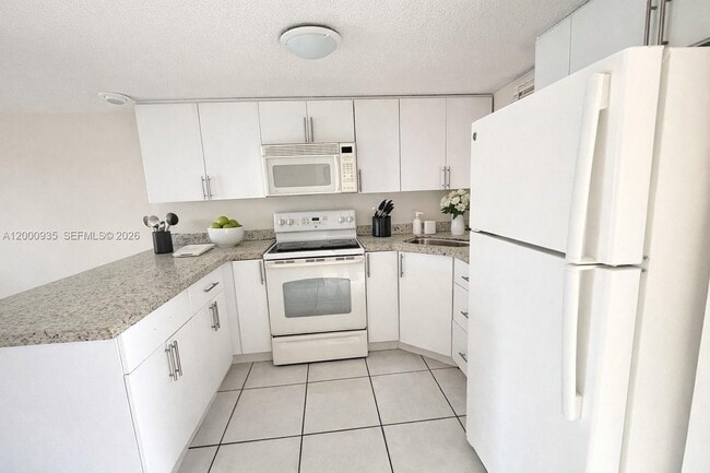 Photo - 5575 W 26th Ct Unit 203