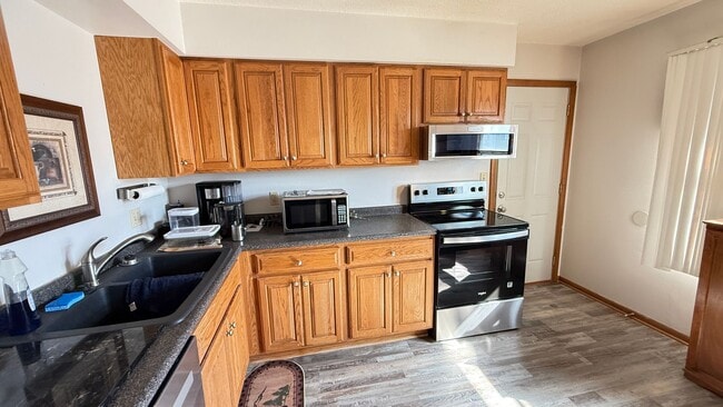 Photo - Updated two bedroom ranch duplex with part...