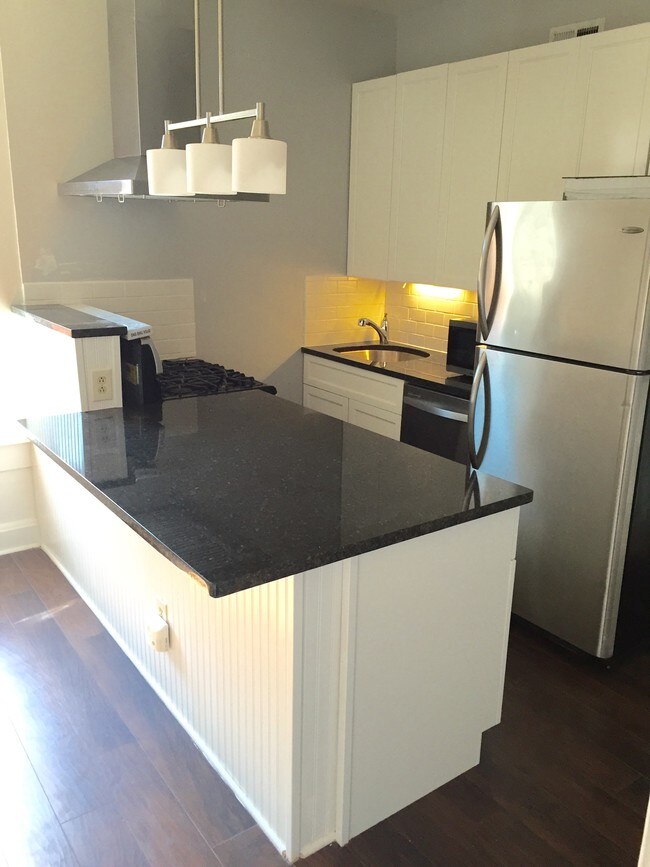 Newly remodeled kitchen - 644 W Schubert Ave Apartments Unit 3 Front
