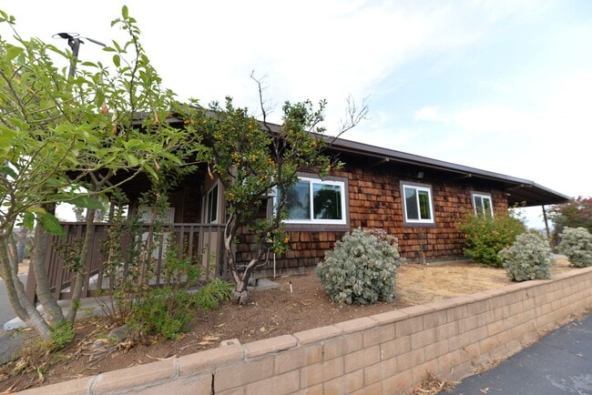 Building Photo - Charming Single Level 3 Bedroom 2 Bath Home perched on hill!
