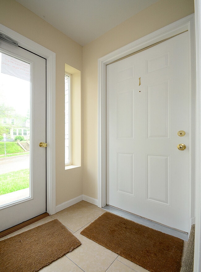View from building entrance area into apt door - 3903 Cass St Unit #1